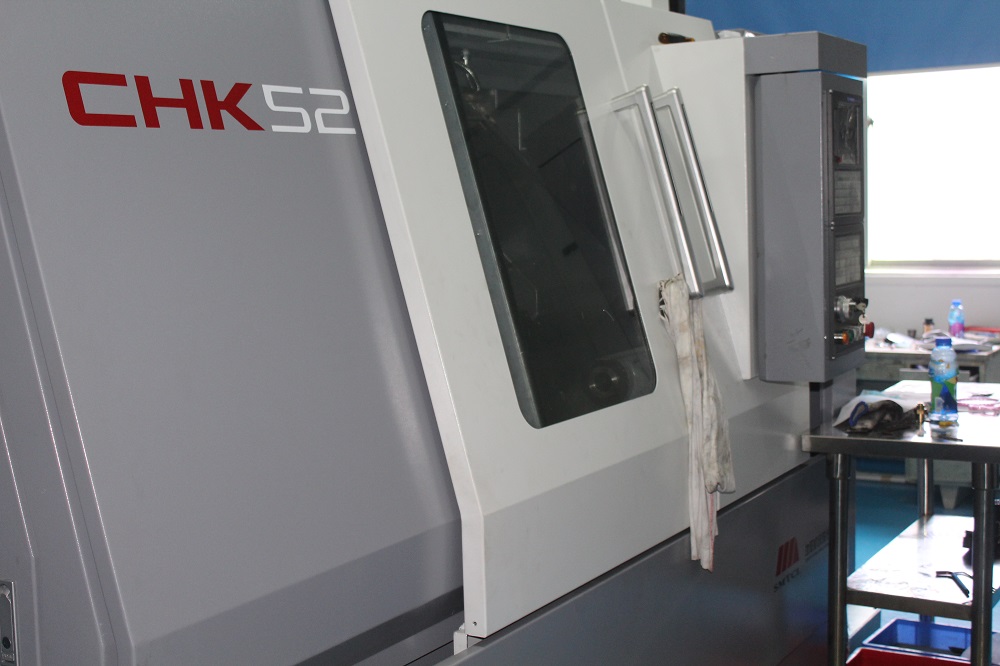 深圳市鼎鑫盛科技——光学镜片加工设备